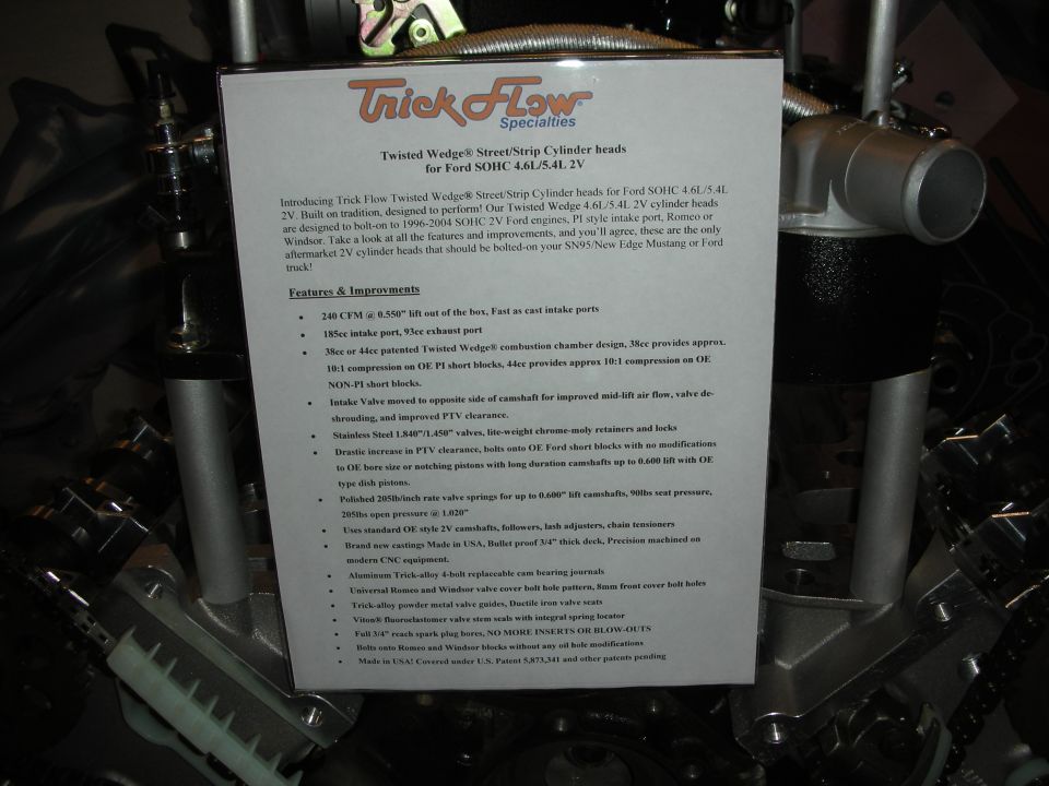 Trick Flow Specialties cylinder heads for Ford SOHC 4.6L/5.4L 2V engine, with informational sign