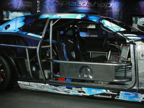 1998 Ford Crown Victoria - Custom race car interior and side view, a roll cage and sponsor decals.