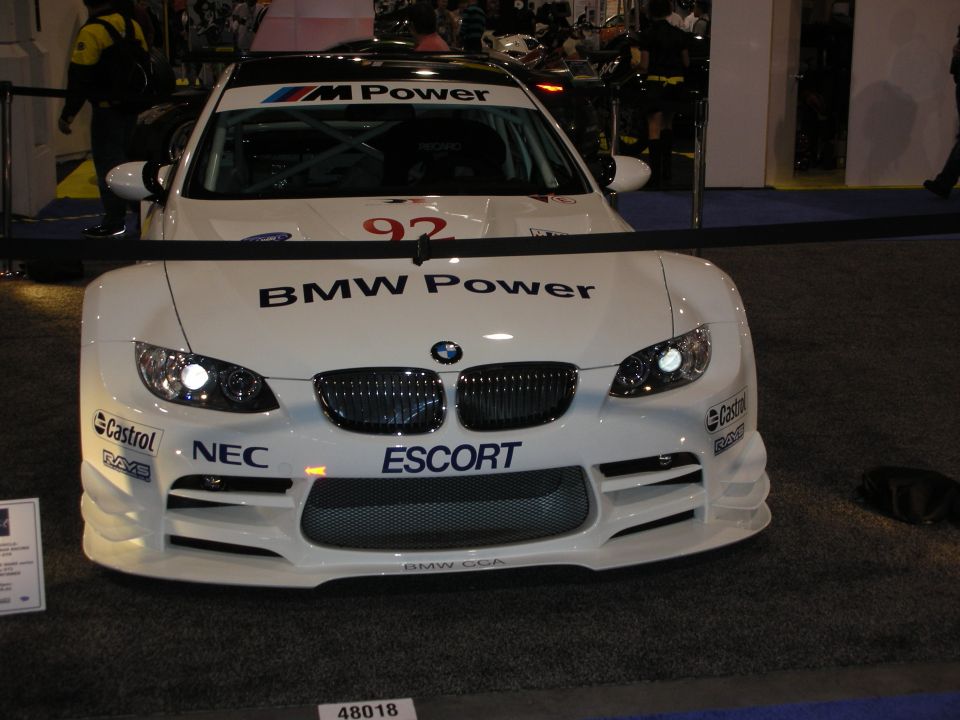 White BMW M3 race car front view with "BMW Power" and "M Power" decals