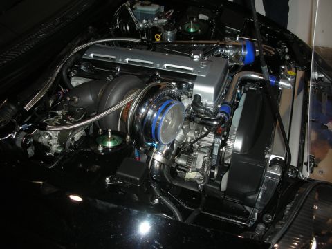 1998 Ford Crown Victoria - Customized engine bay a prominent turbocharger and aftermarket components.