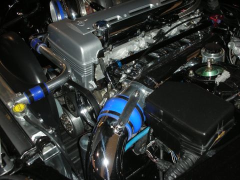 1998 Ford Crown Victoria - Customized engine bay polished chrome intake piping and vibrant blue silicone couplers.
