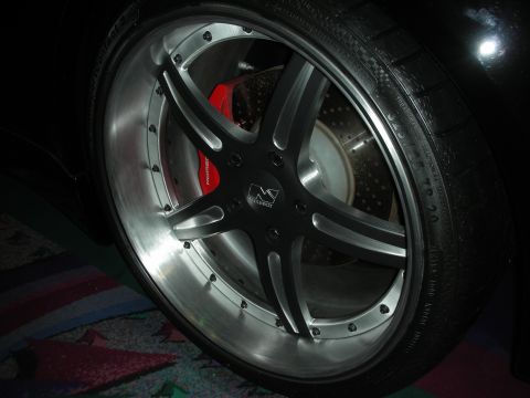 1998 Ford Crown Victoria - Custom wheel and red brake caliper shown on a vehicle.