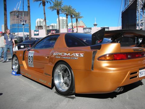 1998 Ford Crown Victoria - This modified Mitsubishi 3000GT VR-4 features a custom body kit and a prominent rear spoiler.