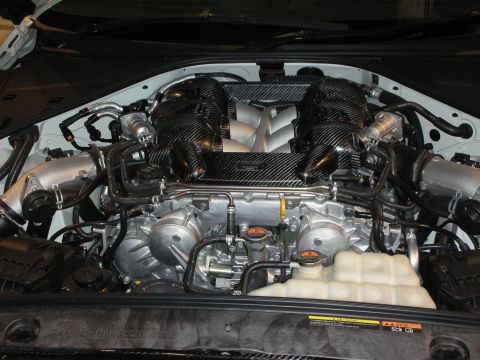 1998 Ford Crown Victoria - The engine bay features a V6 engine with prominent carbon fiber covers and intercooler piping.