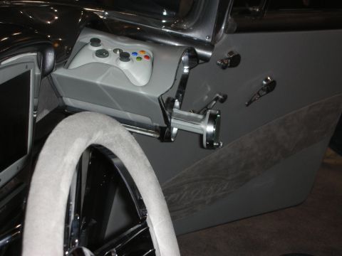 1998 Ford Crown Victoria - This custom car interior features an Xbox controller and a screen integrated into the dashboard.