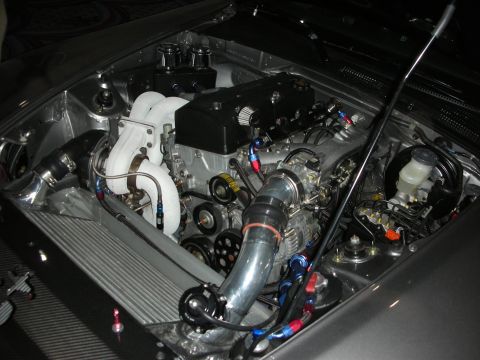 1998 Ford Crown Victoria - Customized engine bay with performance modifications visible.