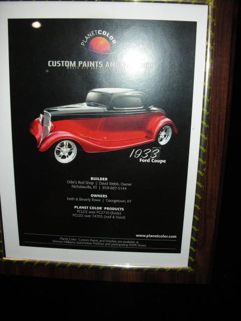1998 Ford Crown Victoria - Planet Color custom-paint advertisement showing a 1933 Ford Coupe with builder and product codes listed.