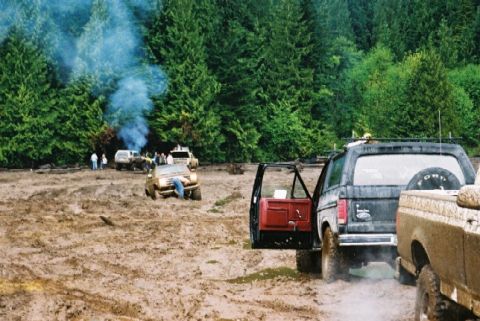 1985 Ford Bronco - Fords pulling out a Chevy