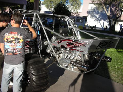 1998 Ford Crown Victoria - Custom off-road buggy with flame graphics and 'High Fab Fabrication' text visible on the rear wing.