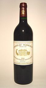 1984 Ford Bronco - A bottle of Chateau Margaux wine is presented against a plain background.
