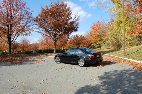 2002 BMW M3 - Black 2002 BMW M3 coupe in a parking lot during the fall season.