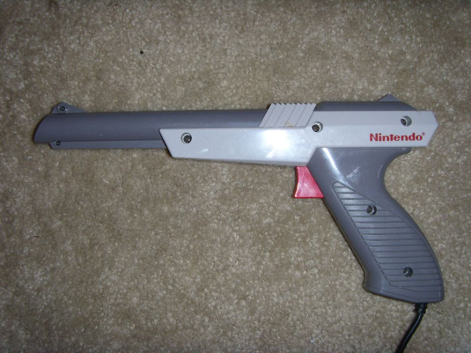 Nintendo Zapper light gun on carpet