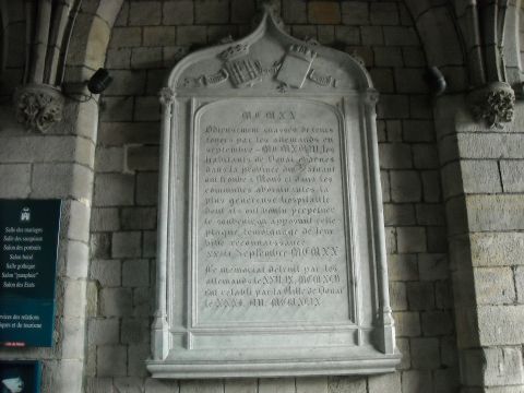 1979 Ford F-150 - Stone memorial plaque inscribed with French text and Roman numerals indicating dates.