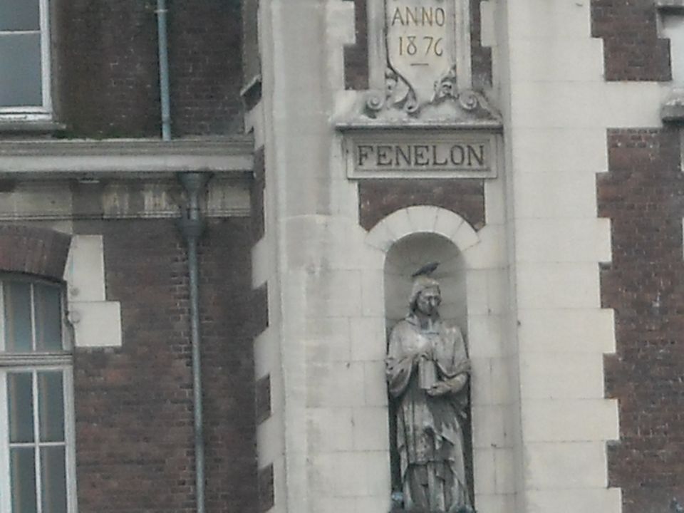 Statue of Fenelon with bird on head, dated 1876