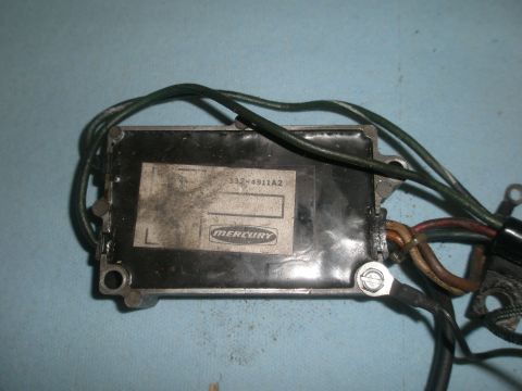 2007 Ford Bronco - A Mercury ignition module with visible wiring and part number 342-4911A2 is shown.