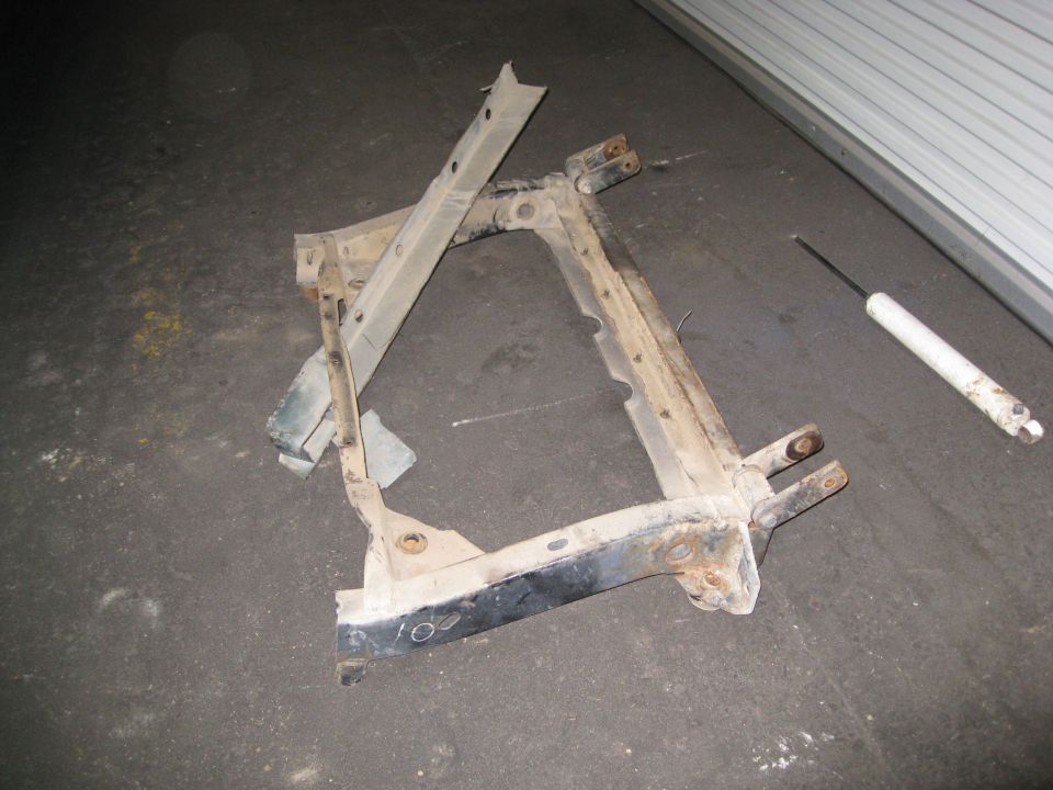 Jeep YJ frame section with visible '102' marking