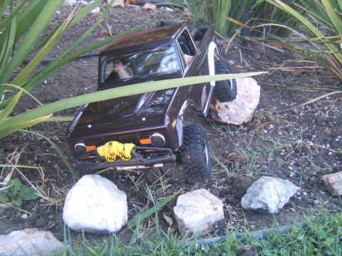 1988 Ford Bronco - This 1988 Ford Bronco RC crawler navigates a rocky, outdoor course.