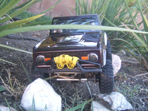 1988 Ford Bronco - RC crawler model of a 1978 Ford Bronco, equipped with yellow KC lights.