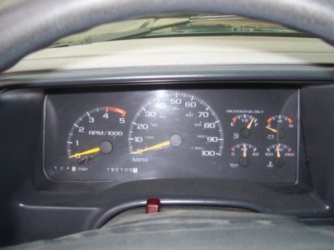 1995 GMC Sierra 1500 - Interior view of a 1995 GMC Sierra 1500 dashboard, showing the instrument cluster with various gauges.