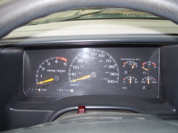 1995 GMC Sierra 1500 dashboard with speedometer, tachometer, fuel, oil, and temperature gauges
