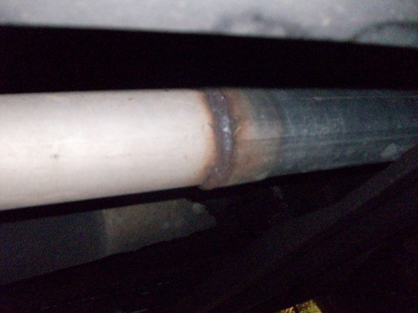Close-up of a welded exhaust pipe section