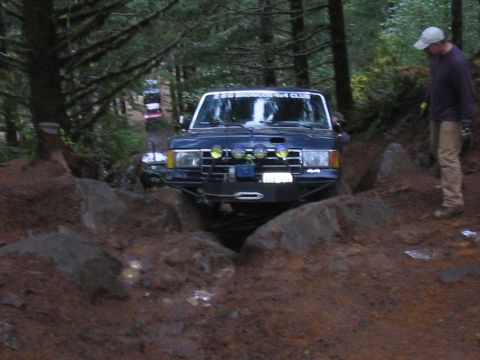 1989 Ford Bronco - A 1989 Ford Bronco tackles a challenging off-road course during a Winterfest event.