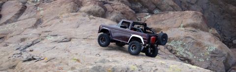 1988 Ford Bronco - This RC Bronco navigates a rocky incline, its off-road capabilities.