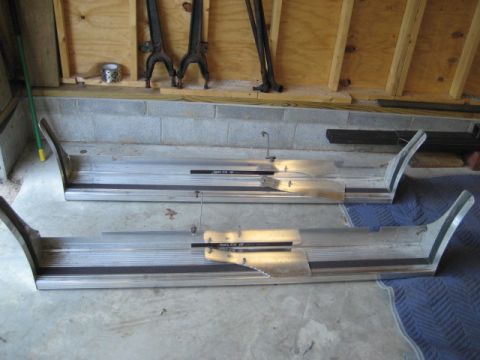 1996 Ford Bronco - Pair of aluminum running boards with black trim, one showing a "DELTA 96" label.