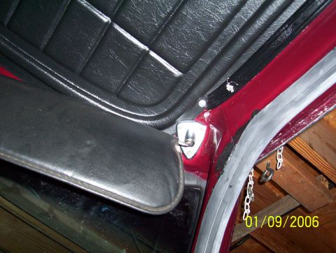 1979 Ford Bronco - Close-up view of the vehicle's interior headliner and sun visor, with a date stamp visible in the corner.