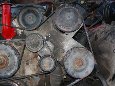 1984 Ford Bronco - Relatively easy install with the three bolts here. One is hiding behind a pulley.