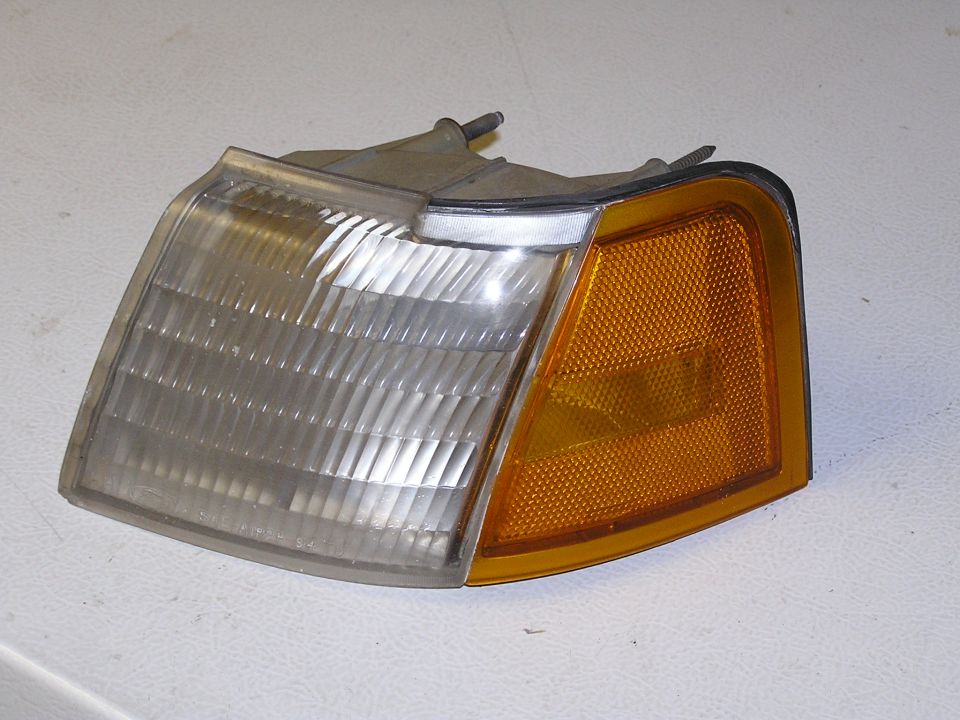 Left Front Corner Signal light cover. Stock