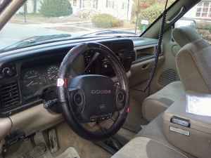 1996 Dodge 1500 - The interior of a 1996 Dodge 1500 truck is visible from the driver's side.