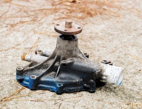 1980 Ford Mustang - A used car water pump is shown, with visible wear and tear.