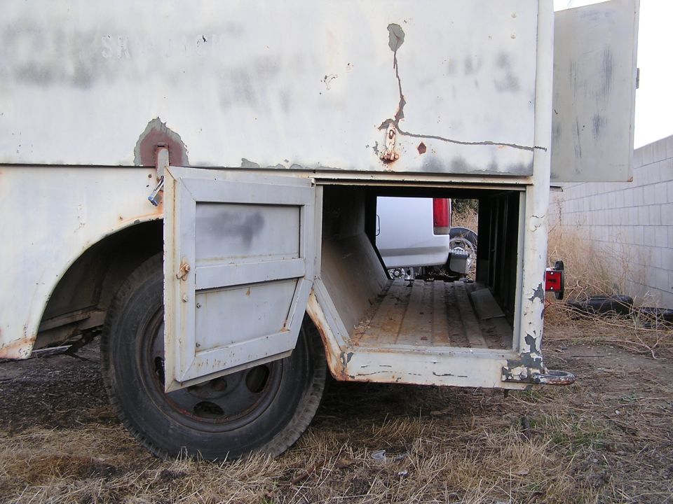 Side view of cargo area of WWII ammunition trailer?