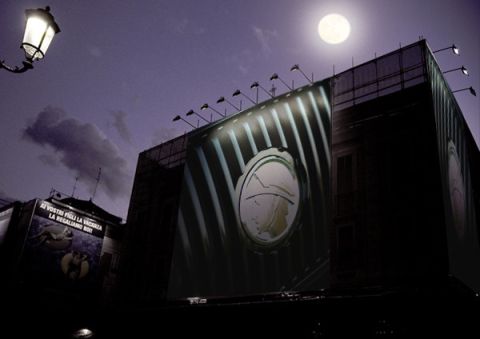 2003 Mercury Marauder - A nighttime scene shows a billboard with a prominent circular logo under a full moon.