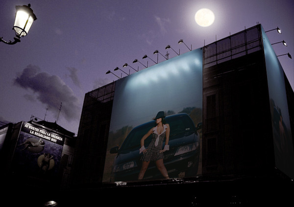 Billboard at night shows a woman in a hat and dress leaning against a dark car