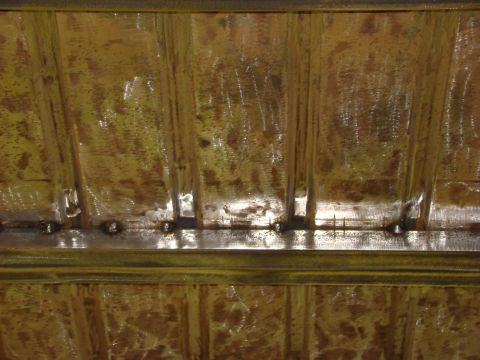 1948 Jeep Wrangler - This image shows a close-up of a welded metal panel with ribbed texture.