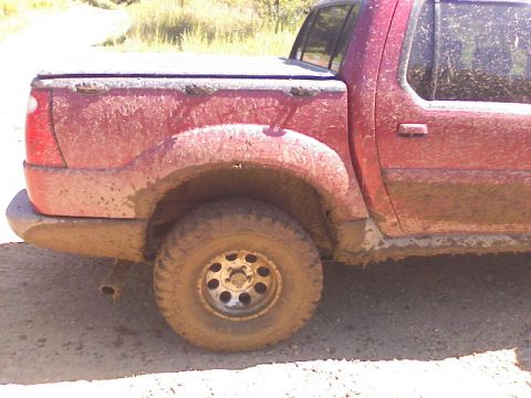 2001 Ford Explorer - This 2001 Ford Explorer is heavily covered in mud after off-road use.