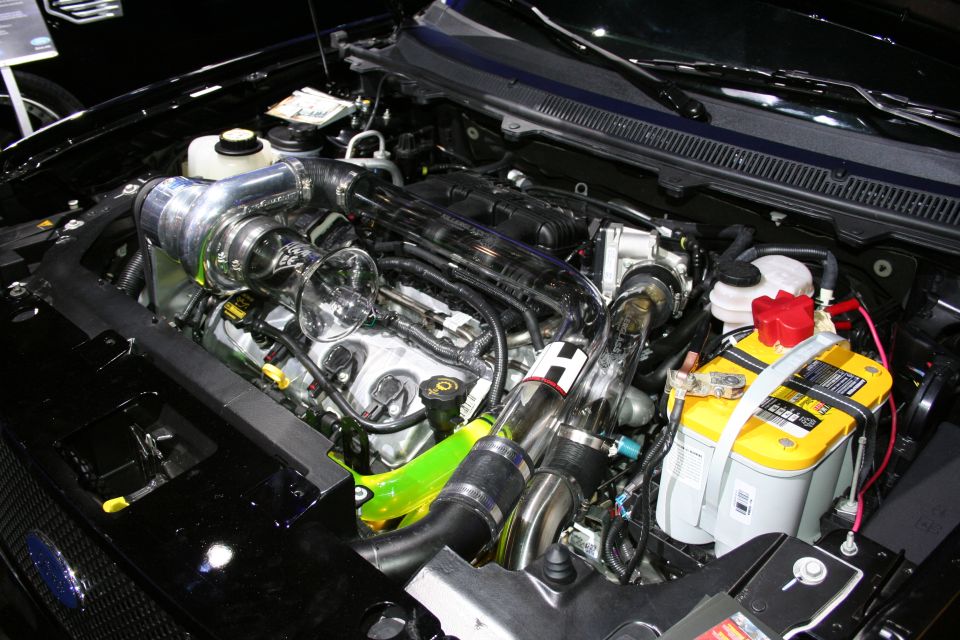 Engine bay with large turbocharger and custom piping