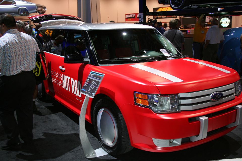 Red Ford Flex with silver stripes and "Hot Rod" text on the side. It has a silver roof and chrome grille