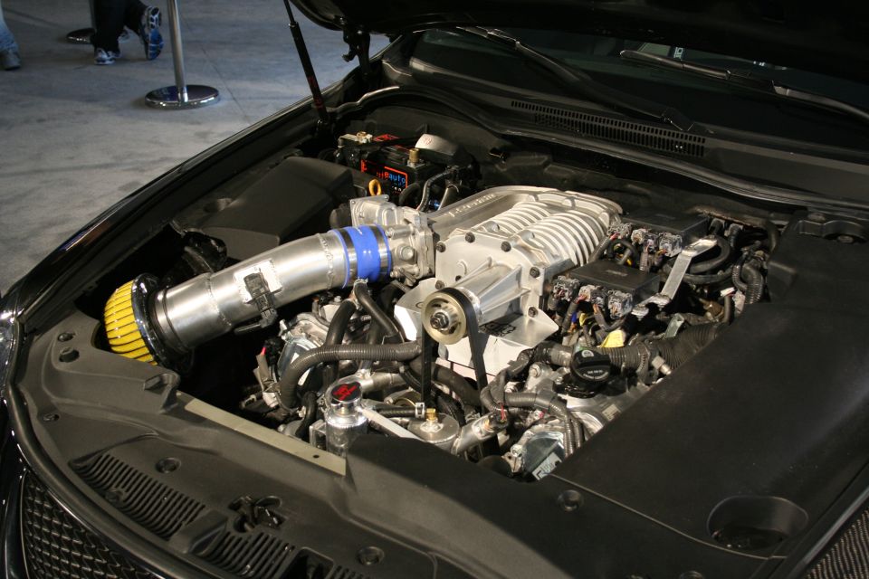 Supercharged engine with silver intake and yellow air filter