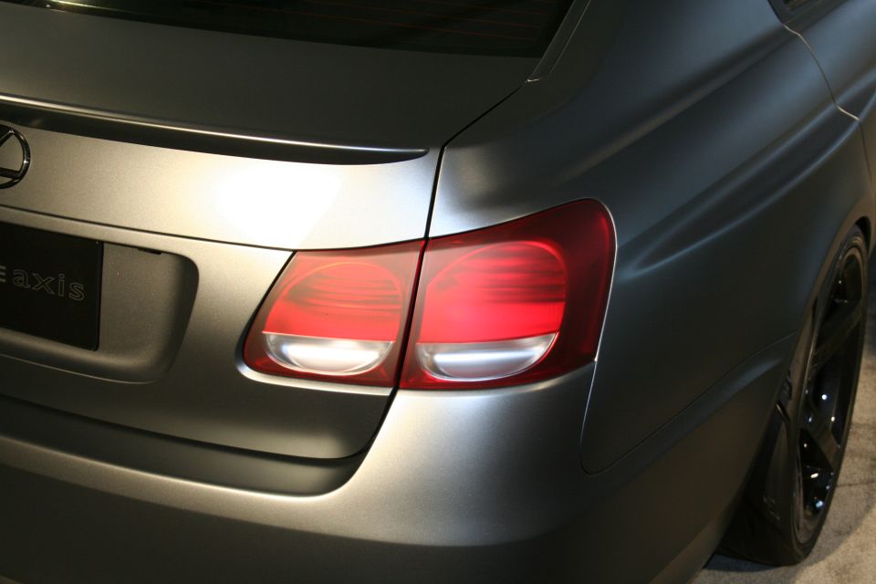 Matte gray Lexus GS 350 rear quarter panel with taillight and spoiler