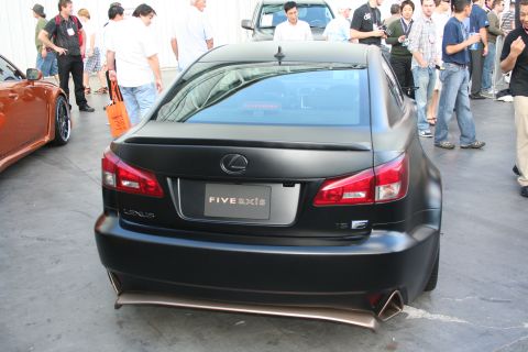 1998 Ford Crown Victoria - Rear view of a matte black Lexus IS F with custom body kit and an orange car nearby.