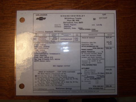 1991 Ford LTD Crown Victoria - Dealer car invoice from Girard Chevrolet detailing a 1974 Corvette purchase with prices, options and VIN.