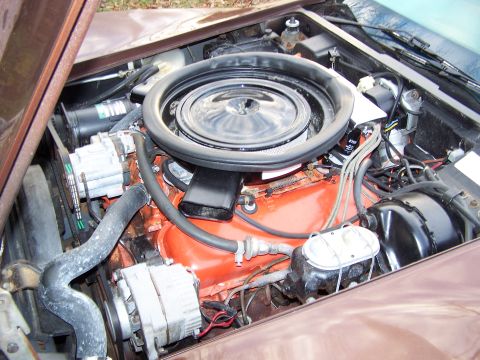 1991 Ford LTD Crown Victoria - Close-up view of a V8 engine bay, showing various components and wiring.