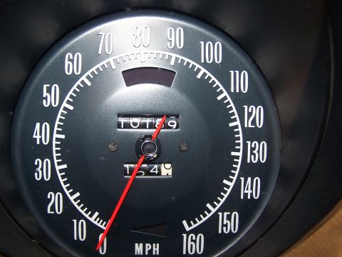 1991 Ford LTD Crown Victoria - Close-up of a car's speedometer and odometer.