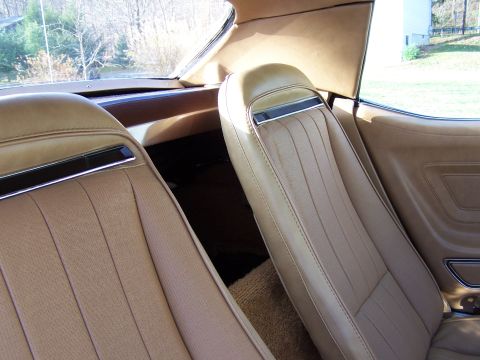 1991 Ford LTD Crown Victoria - Interior view of tan bucket seats and trim in a classic car.