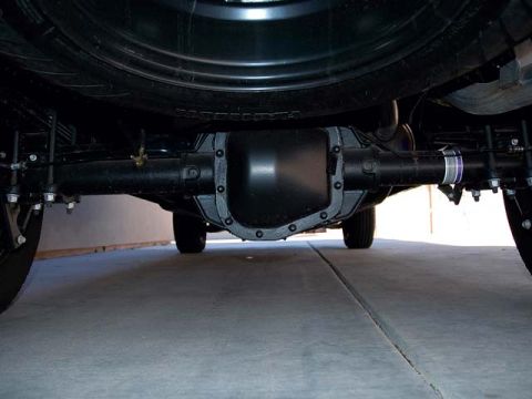 2007 Ford Mustang - Underside view of a vehicle's rear axle and differential assembly, showing suspension components.