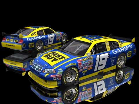 2004 Jeep Wrangler - Two Dodge Chargers with racing decals are displayed on a reflective surface against a black background.