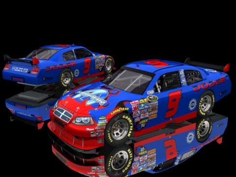 2004 Jeep Wrangler - Two blue and red Dodge race cars with number 9 are displayed on a reflective surface against a black background.